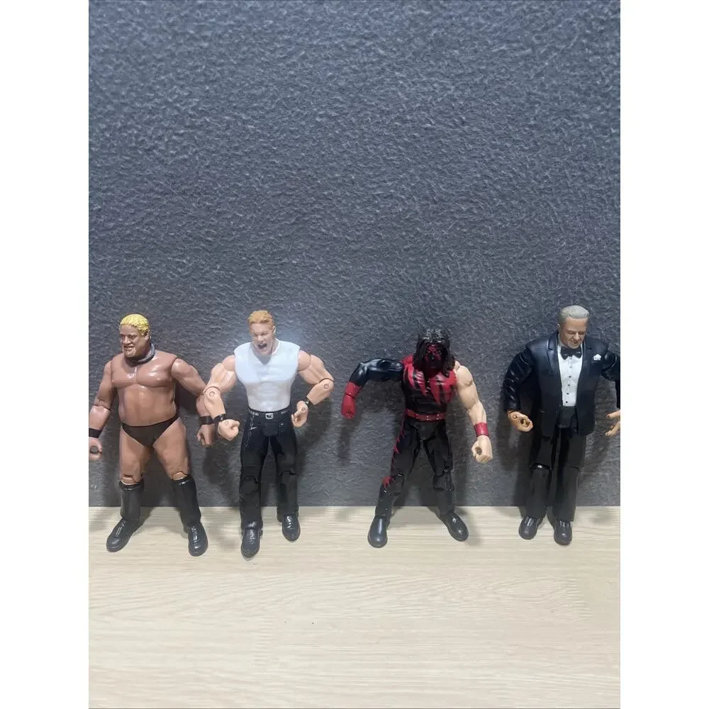 Lot of 12 WWE Wrestling Action Figures Early 1999/2006 Rocky Balboa Rikishi